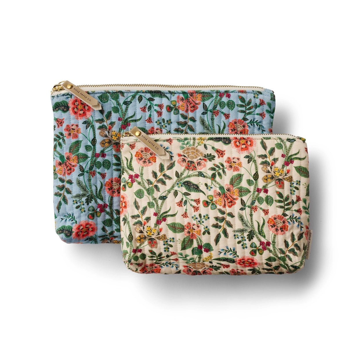 Two floral-patterned pouches on a white background