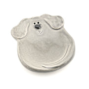 Metallic dog-shaped object on a white background