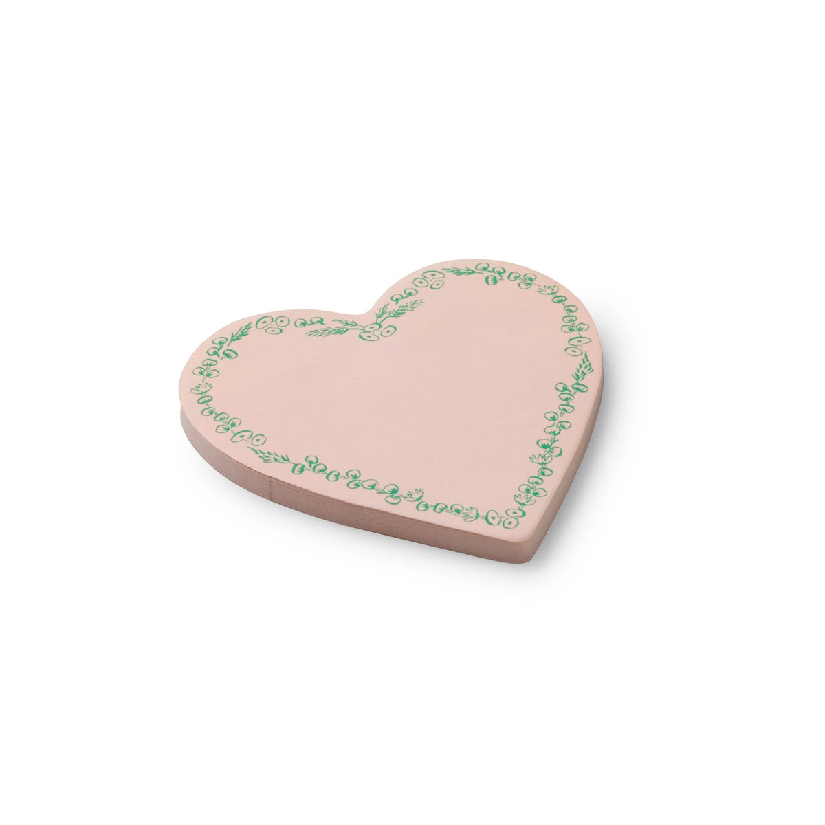 Heart-shaped pink ceramic plate with green floral patterns on a white background