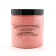 Pink jar with black lid on a white background