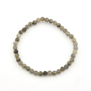 Round beaded bracelet on a white background