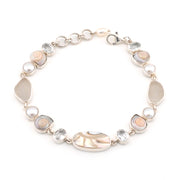 Bracelet with shells, pearl, white topaz on a white background