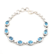 Over Head View Blue Topaz Oval Bali Link Bracelet