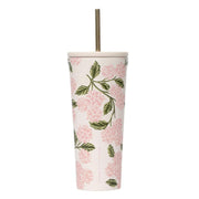 Tumbler with floral design and straw on a white background