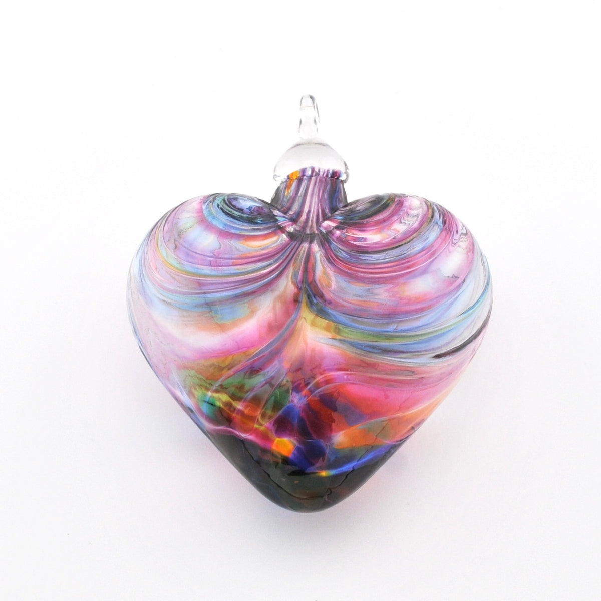 Multicolored glass heart ornament on a white background