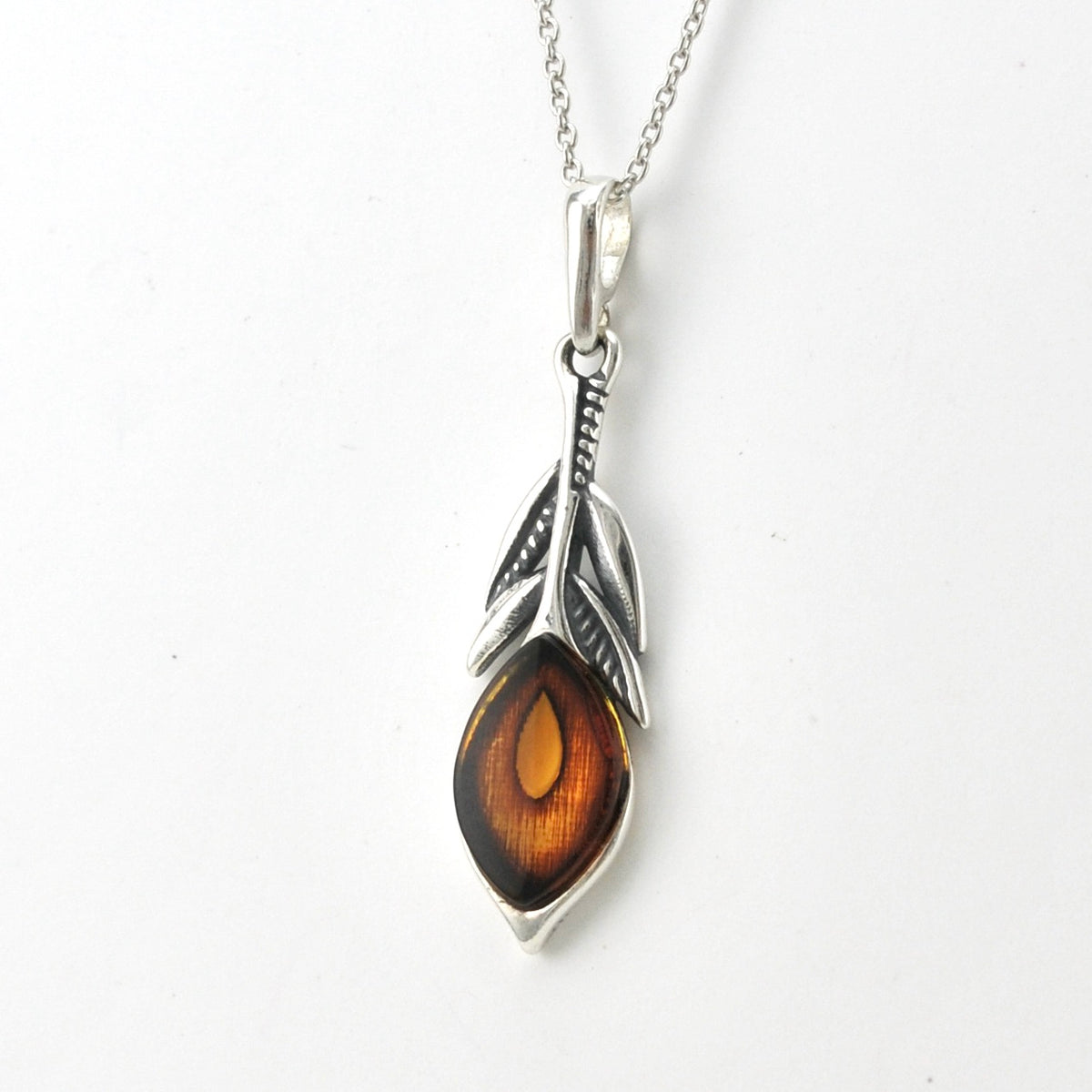 Side View Silver Amber Peacock Feather Necklace