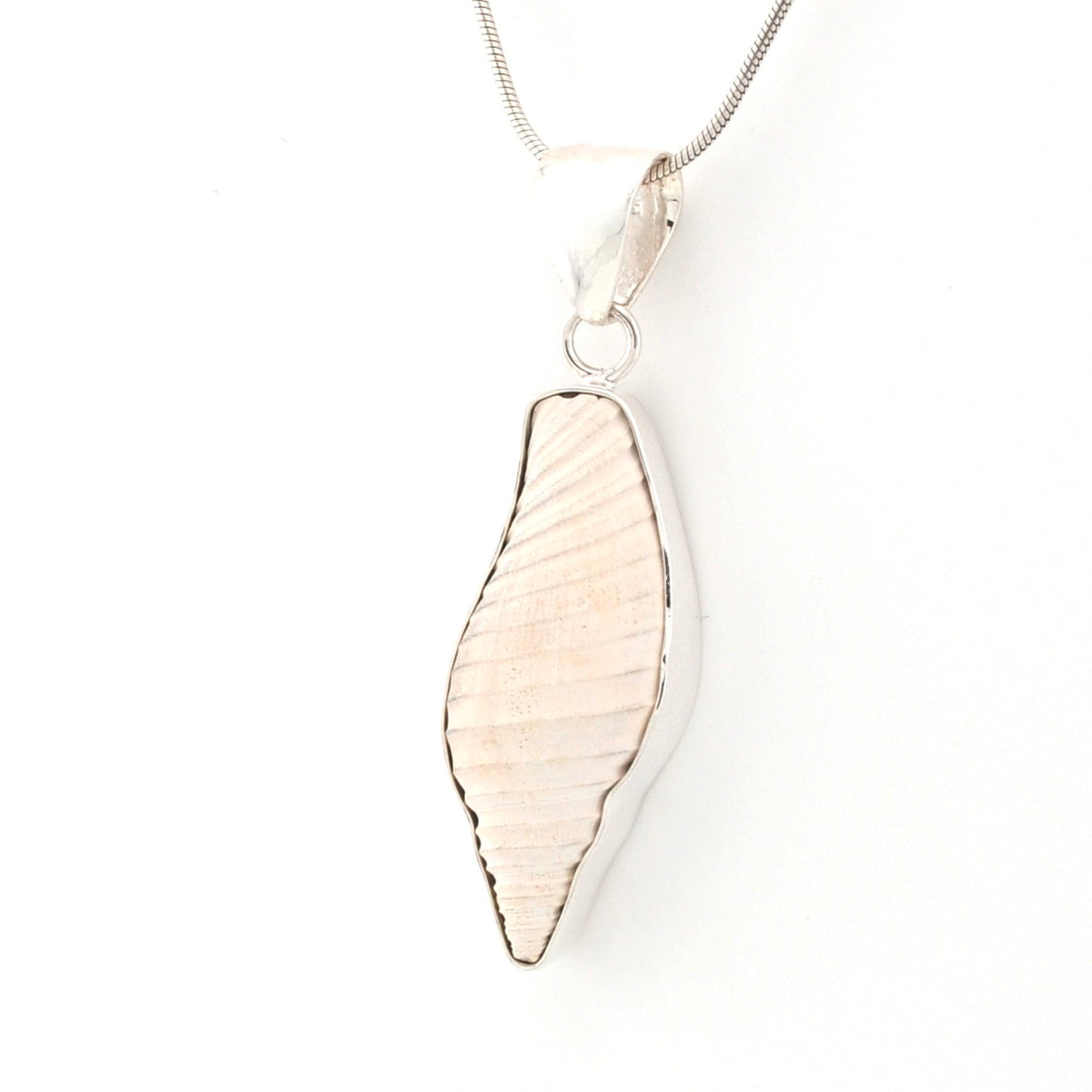 Silver pendant on a white background