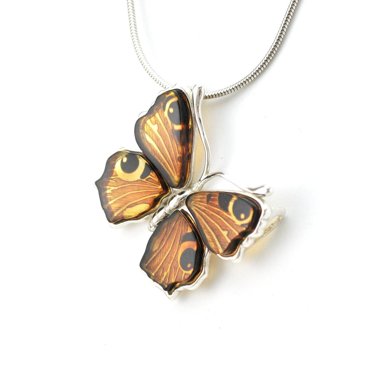Side View Silver Peacock Amber Butterfly Pendant