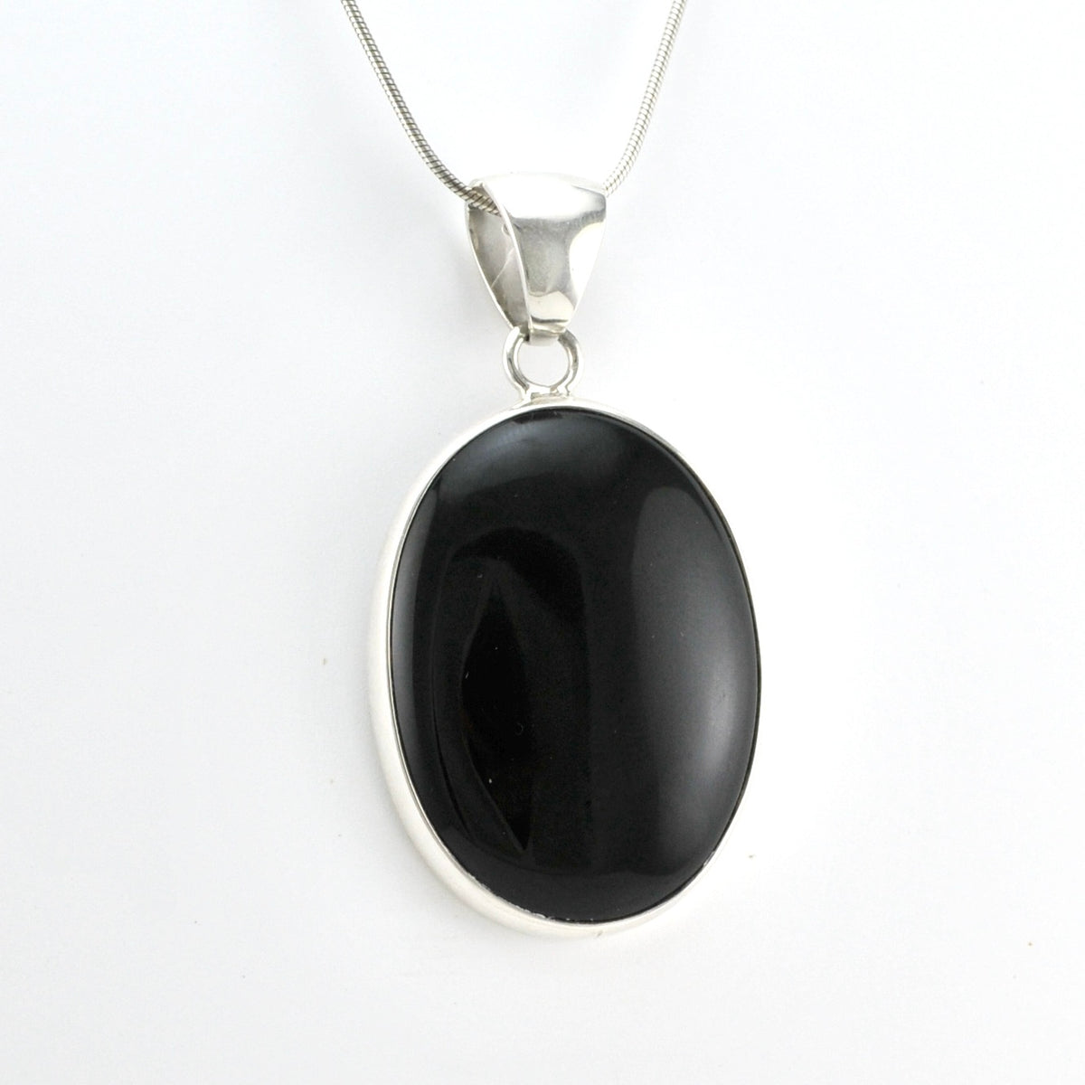 Side View Sterling Silver Black Onyx Oval Pendant