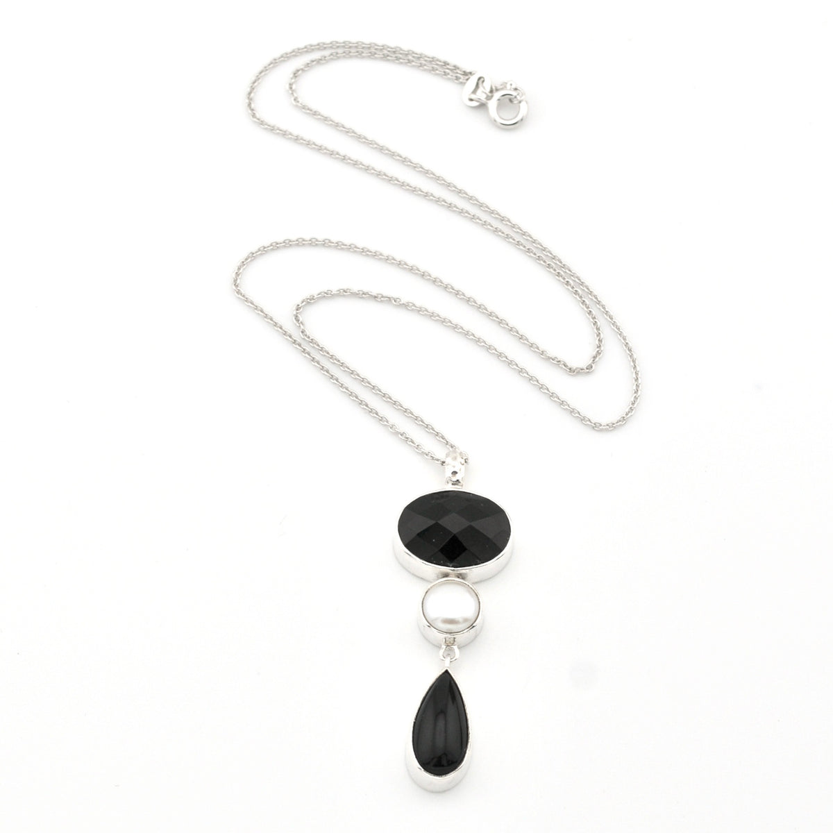 Necklace with black pendant on a white background