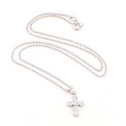 Silver necklace with a cross pendant on a white background