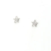 Star-shaped silver earrings on a white background
