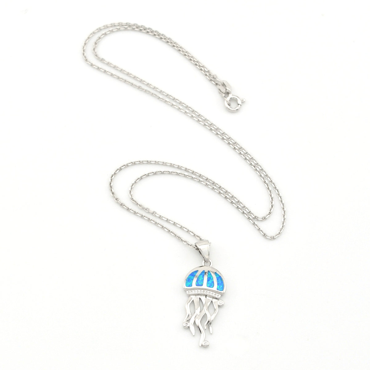 Silver necklace with a jellyfish pendant on a white background