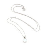 A silver chain necklace with a small oval white opal pendant, displayed on a clean white background.