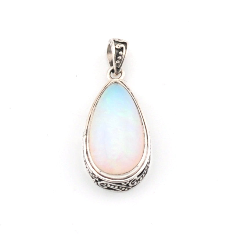 Teardrop-shaped pendant with a light-colored stone on a white background