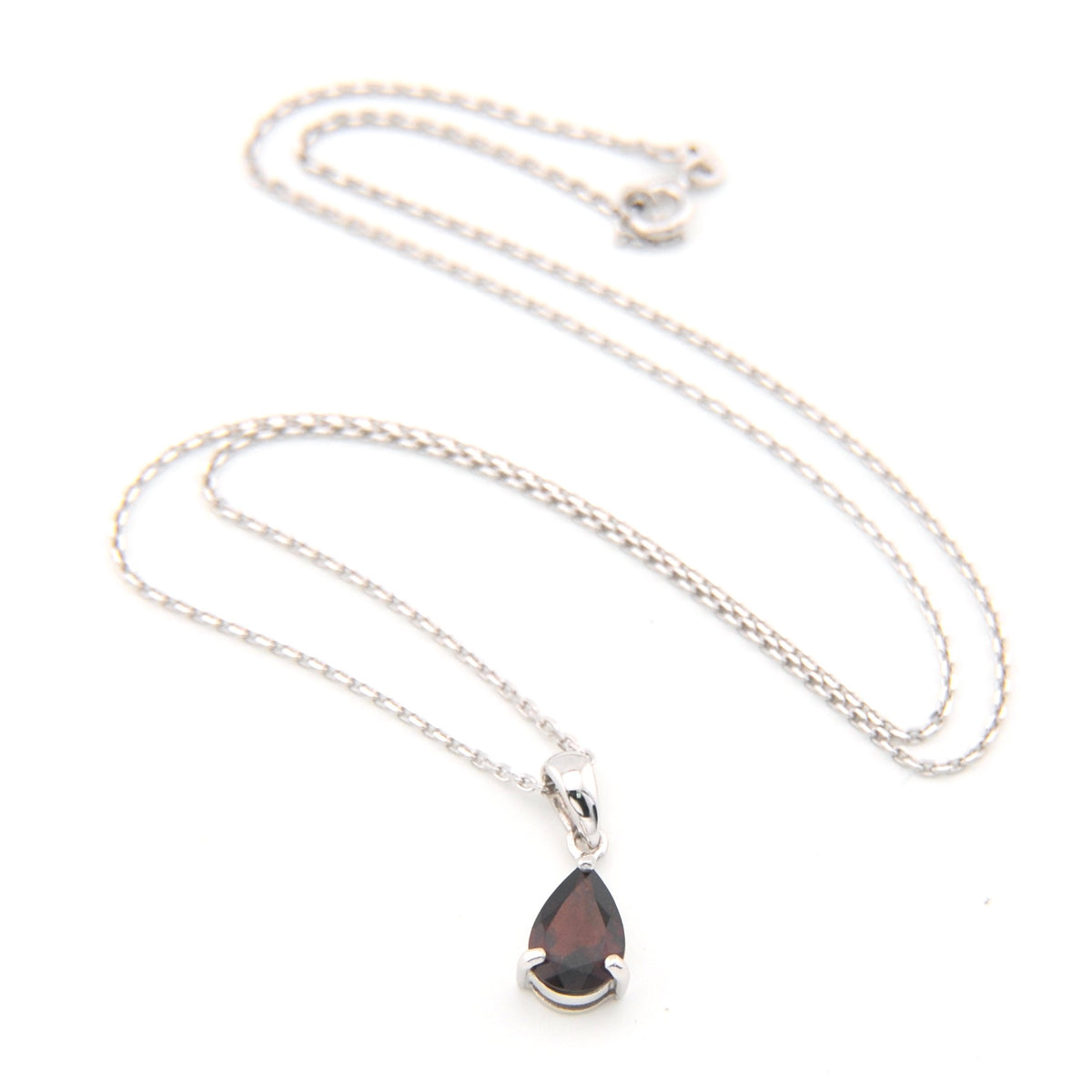 Necklace with a teardrop-shaped pendant on a white background