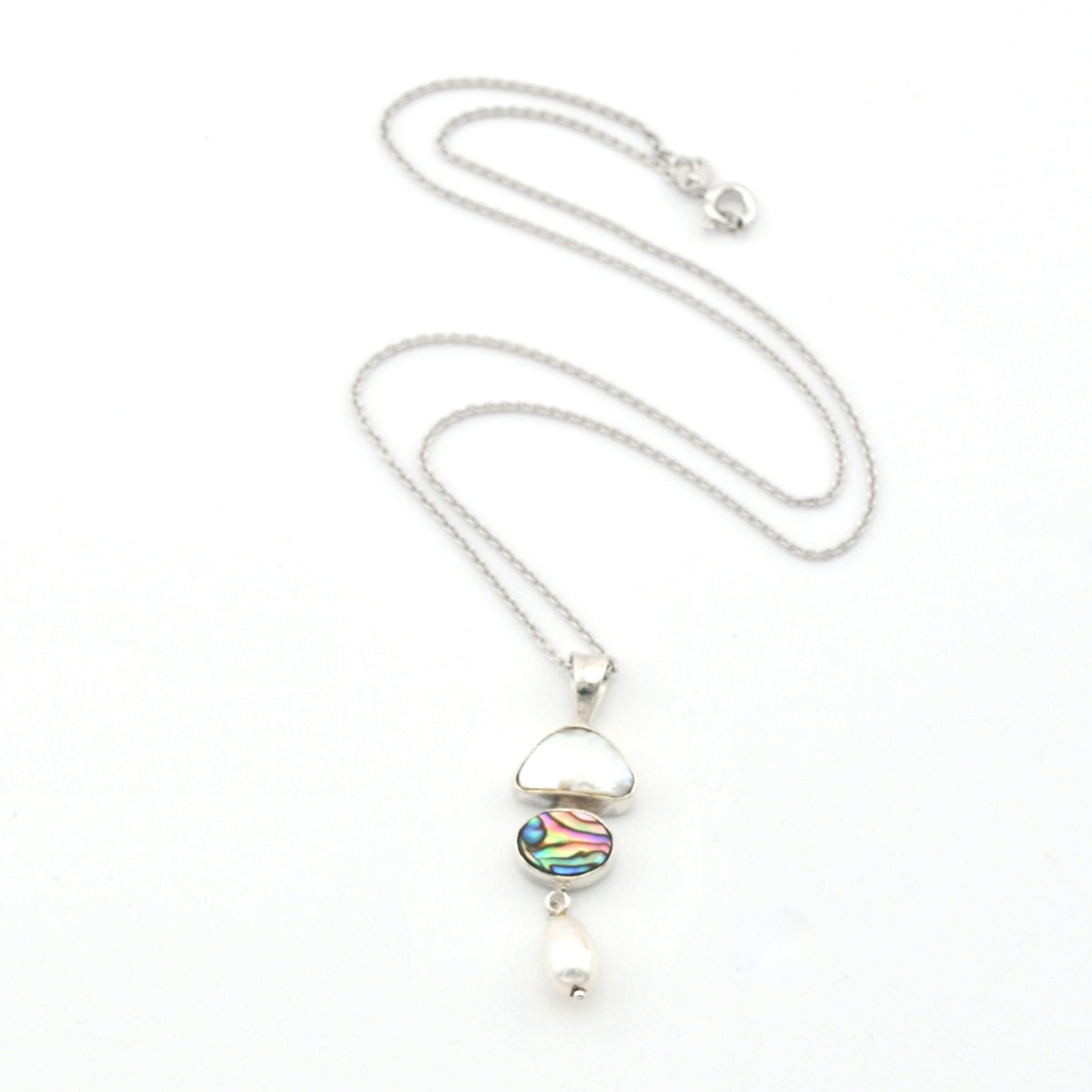 Silver necklace with a colorful pendant on a white background