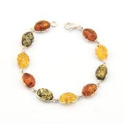 Multicolored amber stone bracelet on a white background