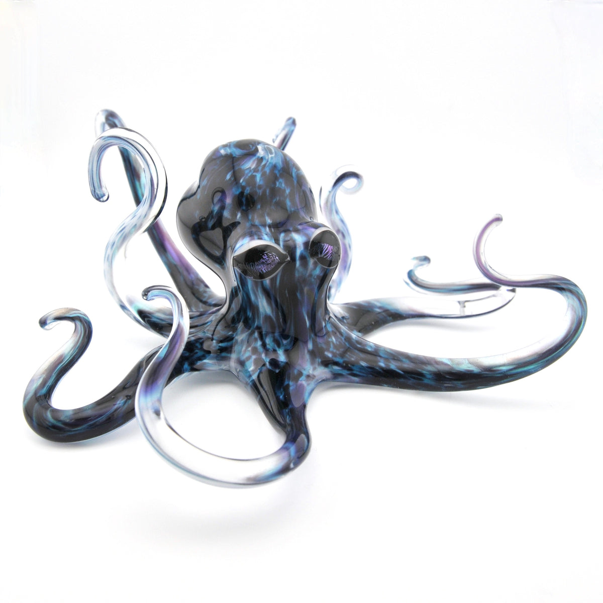 Glass octopus sculpture on a white background