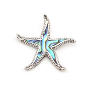 Starfish-shaped pendant with colorful interior on a white background