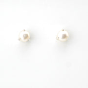 Pair of pearl earrings on a white background