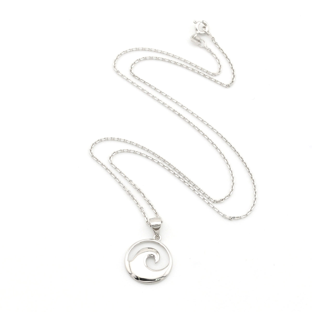 Silver necklace with a wave pendant on a white background