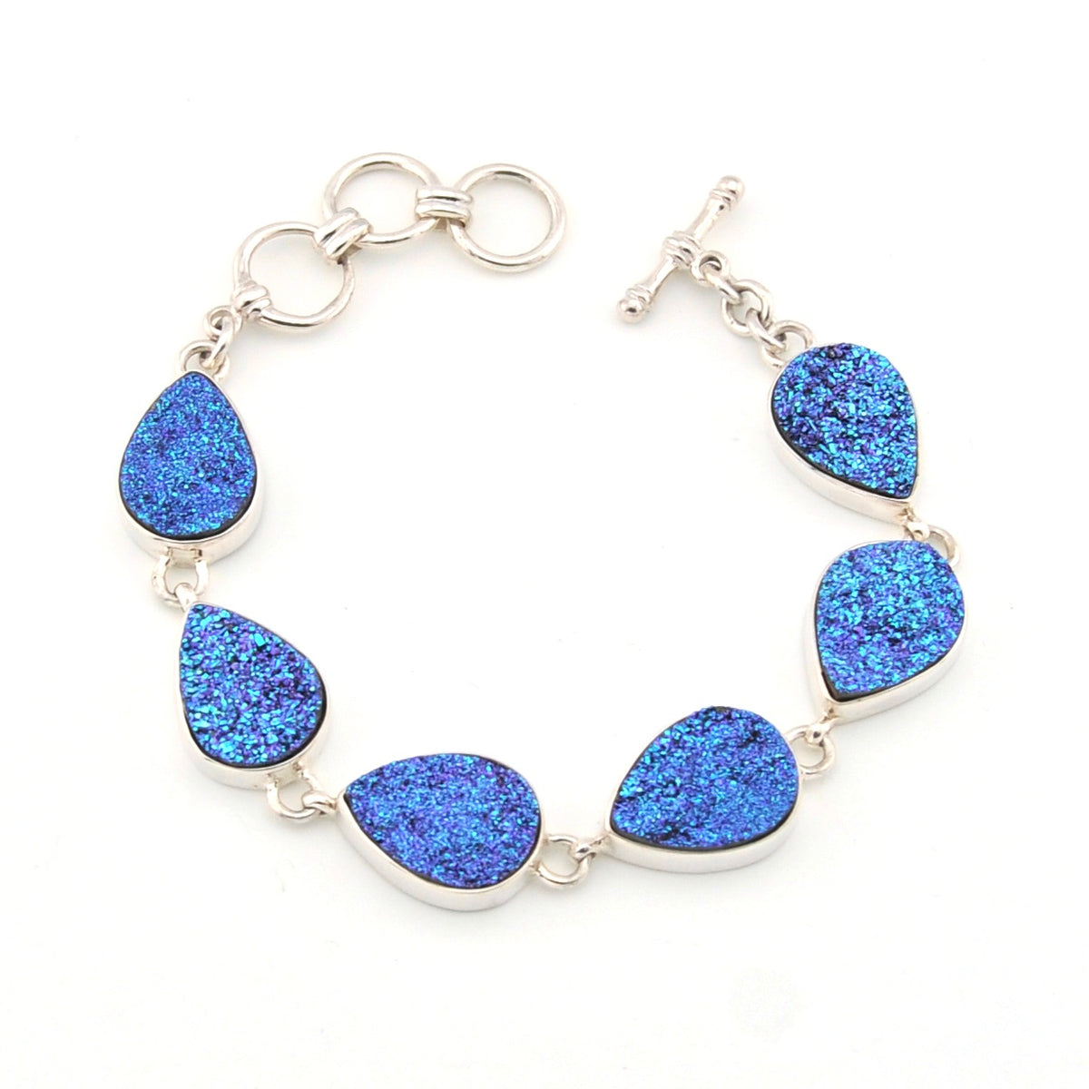 Bracelet with blue teardrop-shaped stones on a white background