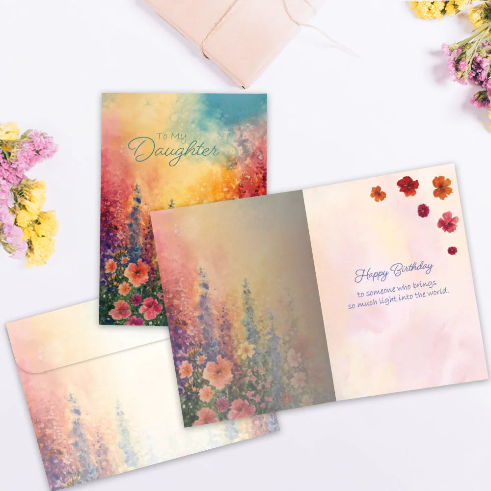 Greeting card with floral design and envelope on a white background