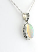 Side View Sterling Silver Ethiopian Opal 8x14mm Oval Bali Pendant