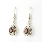 Side View Sterling Silver Garnet 5x7mm Twist Tear Earrings