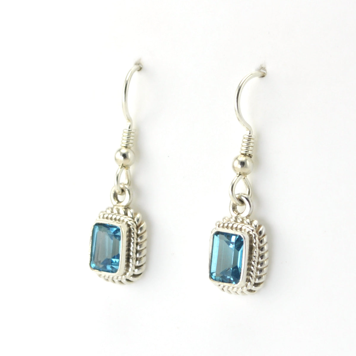 Side View Silver Blue Topaz 5x7mm Rectangle Dangle Earrings