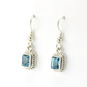 Side View Silver Blue Topaz 5x7mm Rectangle Dangle Earrings