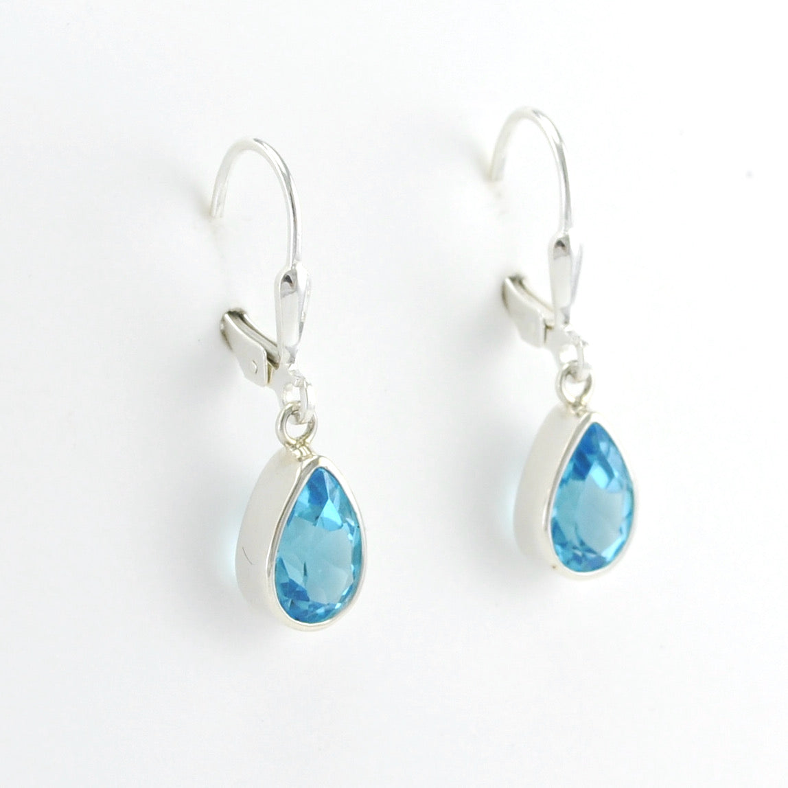 Side View Silver Blue Topaz 6x9mm Tear Dangle Earrings