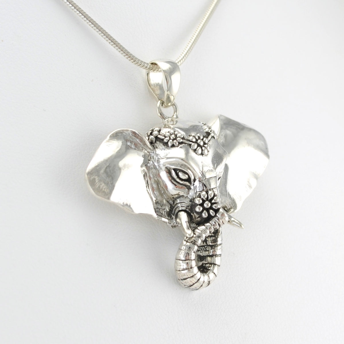 Side View Silver Elephant Flower Pendant