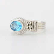 Side View Silver Blue Topaz 6x8mm Oval Ring