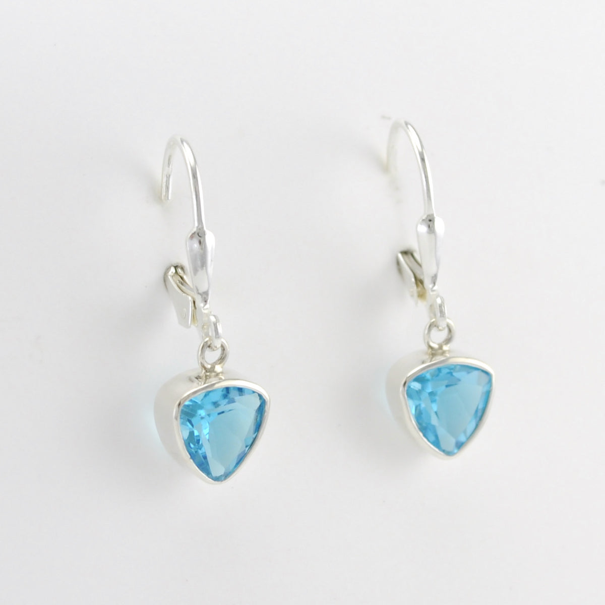 Side View Silver Blue Topaz 7mm Trillion Dangle Earrings