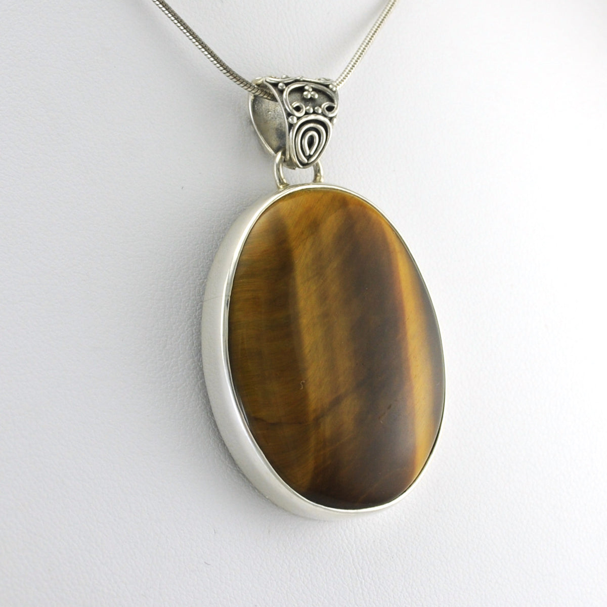 Side View Silver Tiger's Eye 28x36mm Oval Pendant