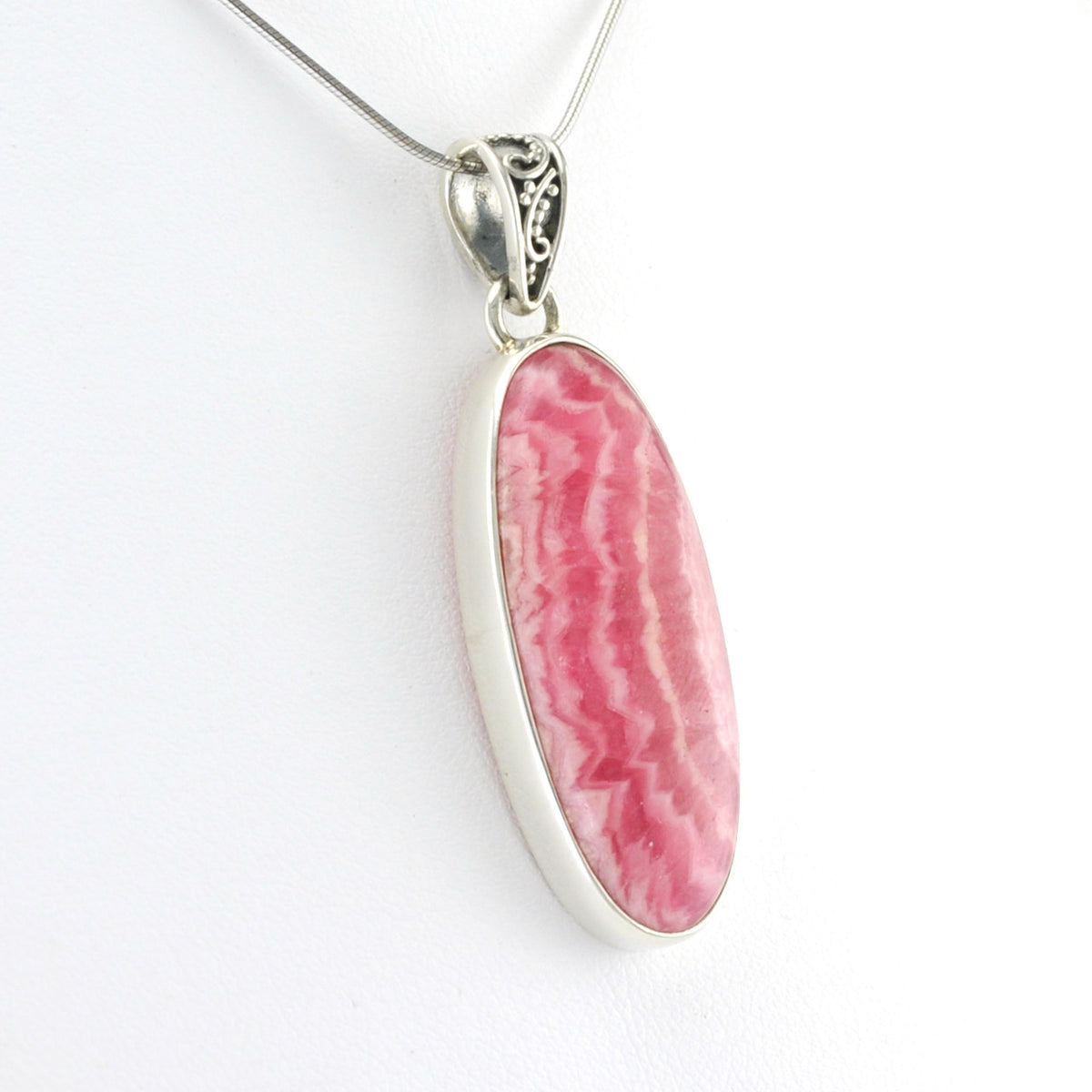 Side View Silver Rhodochrosite 14x35mm Oval Pendant