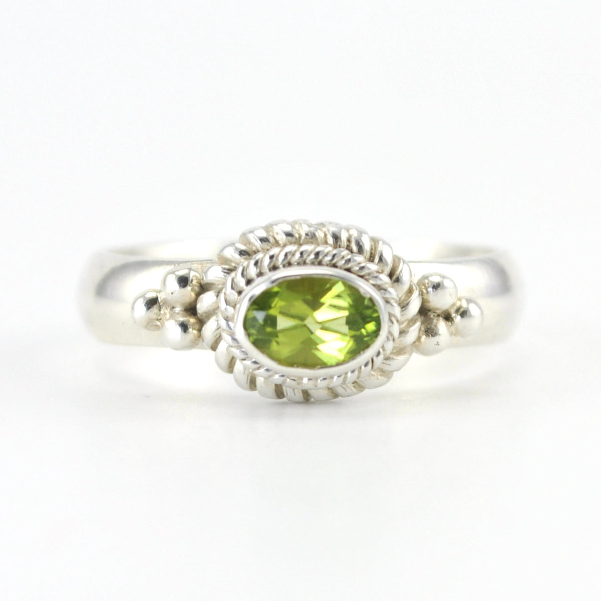 Silver Peridot 4x6mm Oval Ring