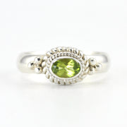 Silver Peridot 4x6mm Oval Ring