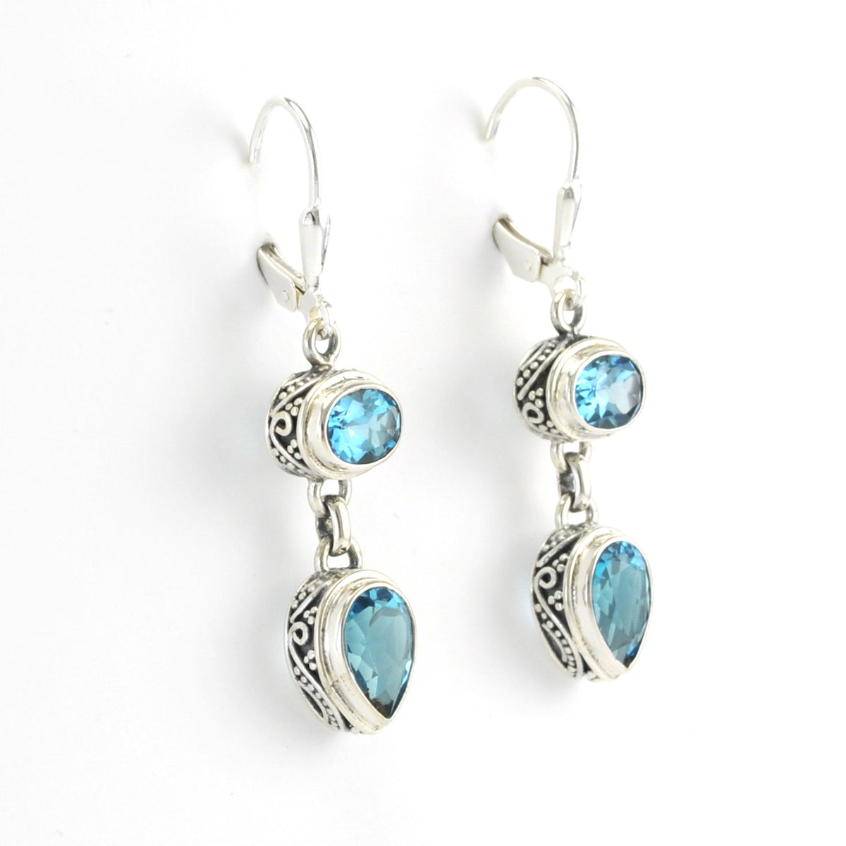 Side View Silver Blue Topaz Oval Pear Bali Dangle Earrings