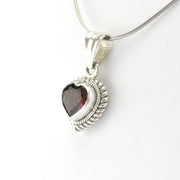 Side View Silver Garnet Heart Pendant